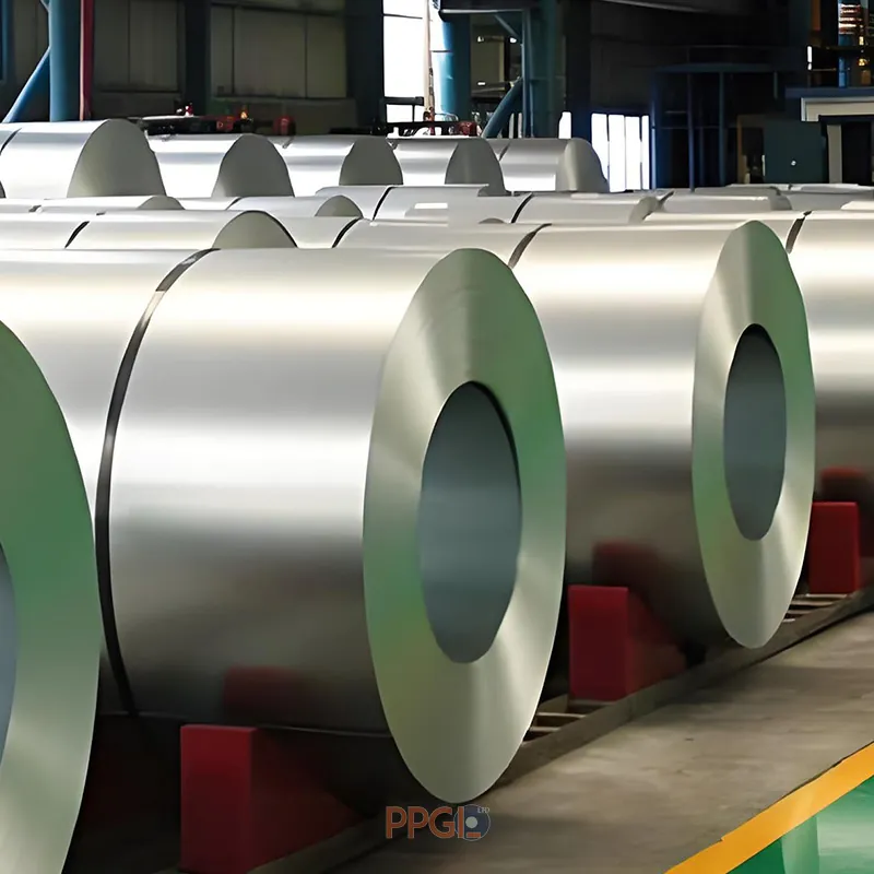 Galvanized steel coils neatly stacked in factory warehouse