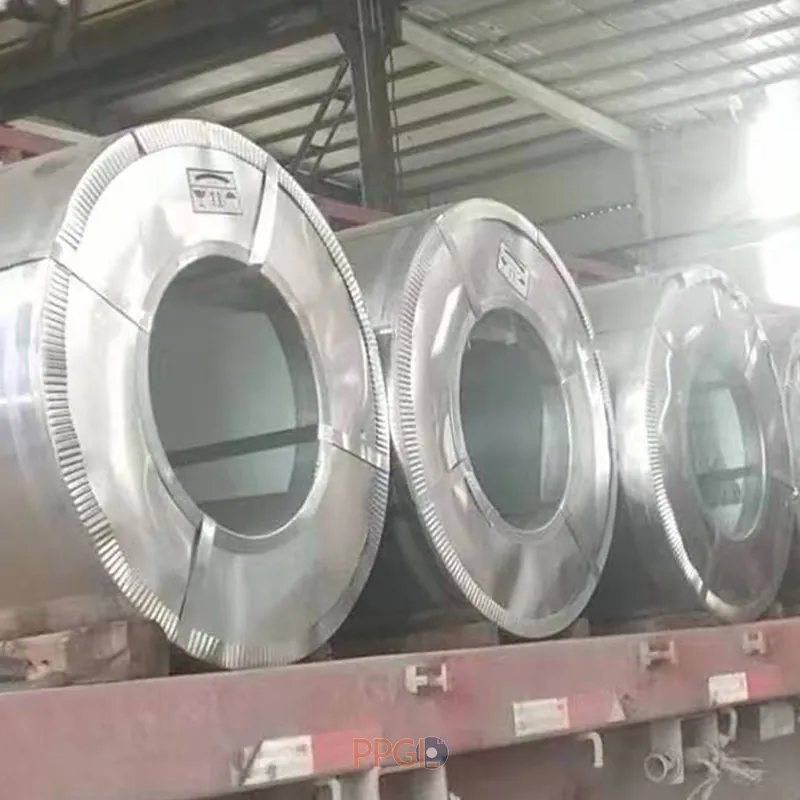 PPGI steel coils secured on heavy duty steel cradle in shipping container