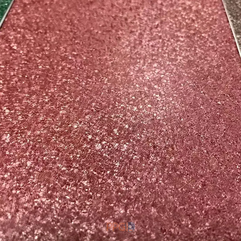 Red matt wrinkle ppgi steel coil surface close up showing fine texture