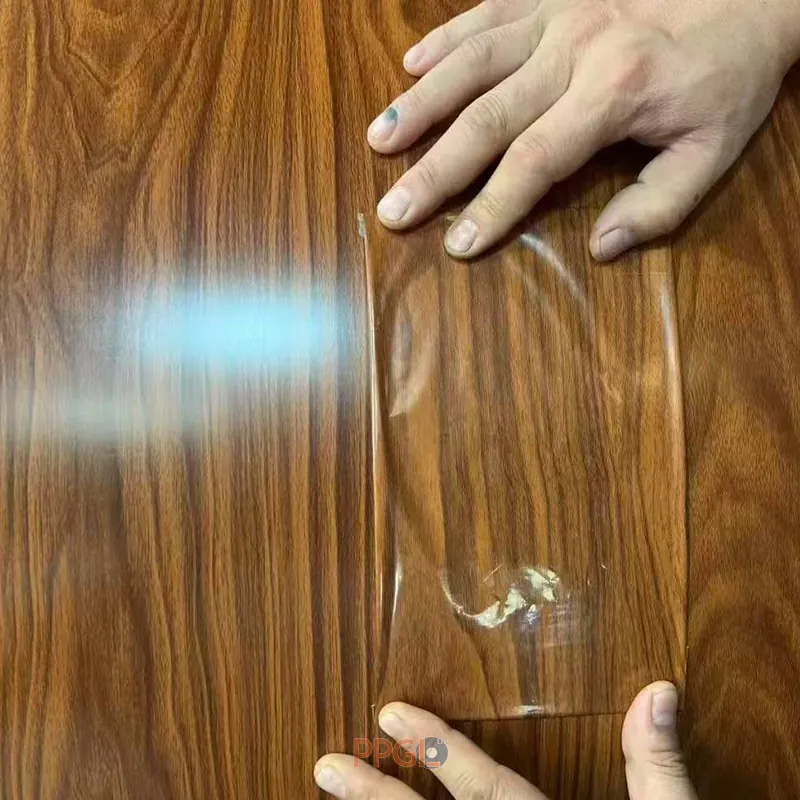 QC testing protective film adhesion and peeling on wood grain printed ppgi sheet