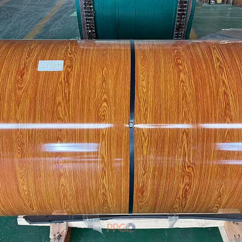 Wood grain printed ppgi steel coil secured with steel strap in factory