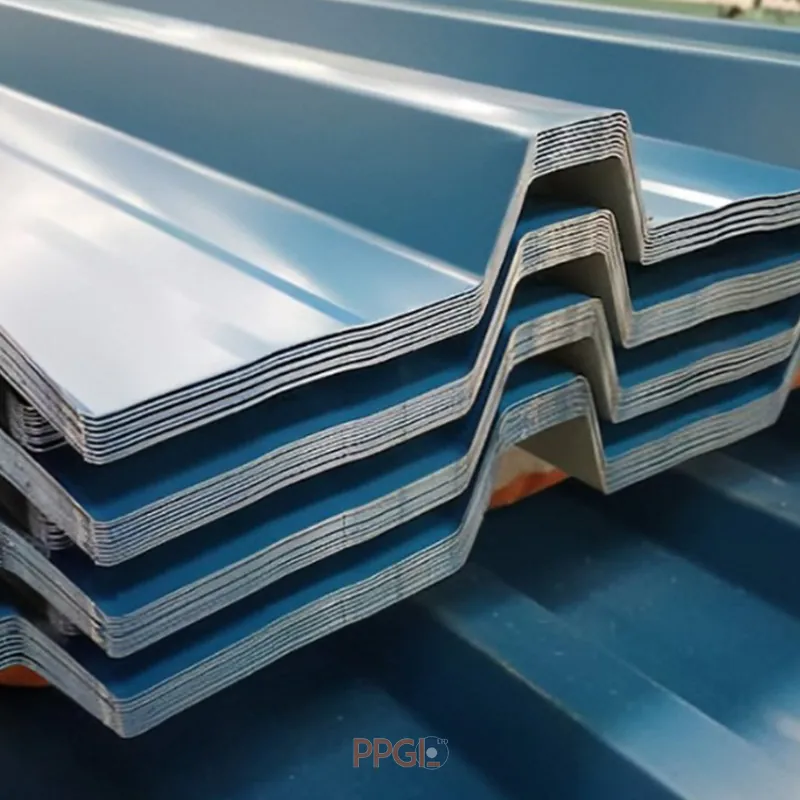 Blue prepainted IBR steel roofing sheets stacked in factory