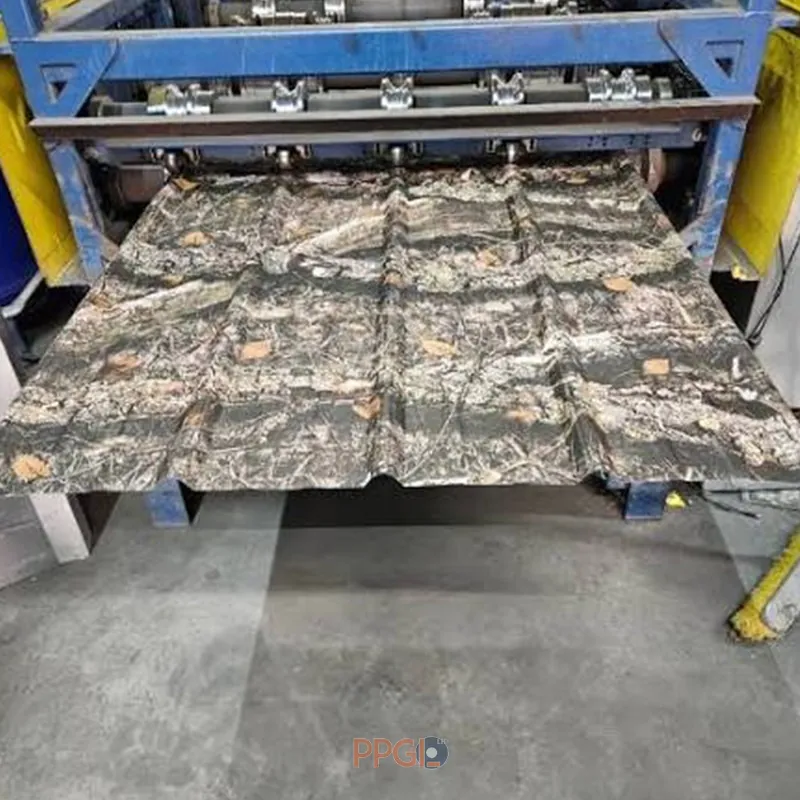 Patterned color coated aluminum roofing sheet coming out of forming machine