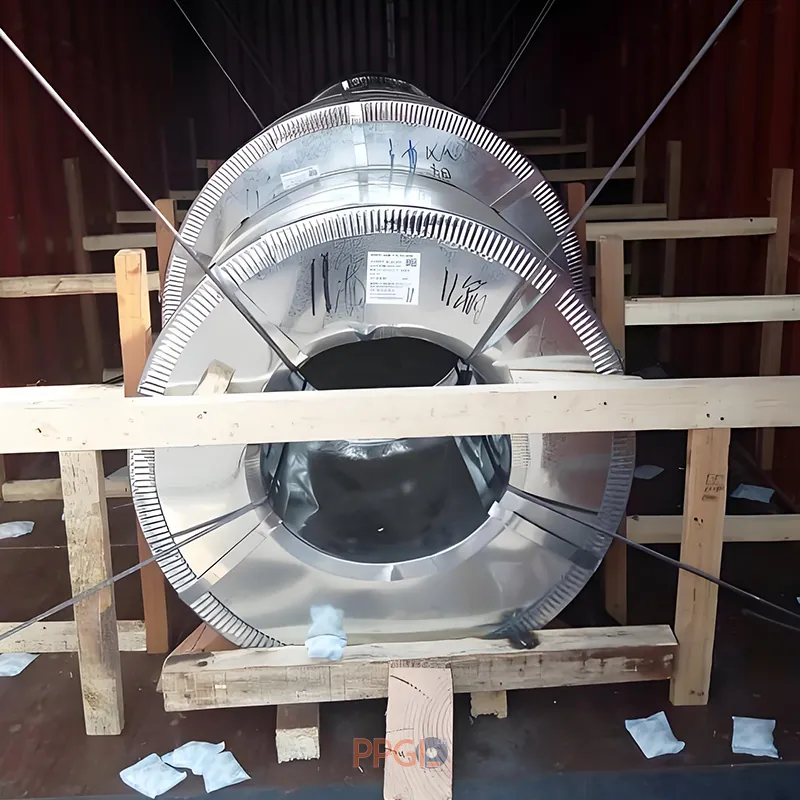 Heavy-duty steel coil container lashing and wooden bracing for export sea freight protection.