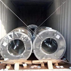Double row steel coils reinforced with wooden frames and wire ropes inside shipping container.