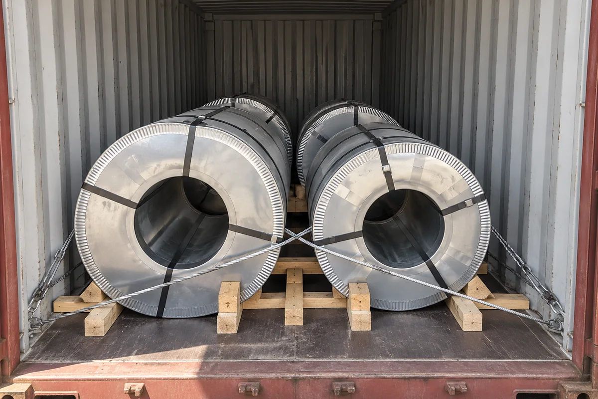 Steel coils secured inside a 20ft container for Ghana